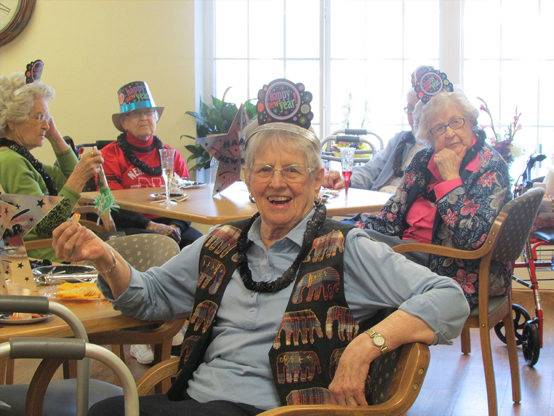 Seniors celebrating New Year at Evergreen Assisted Living Residence